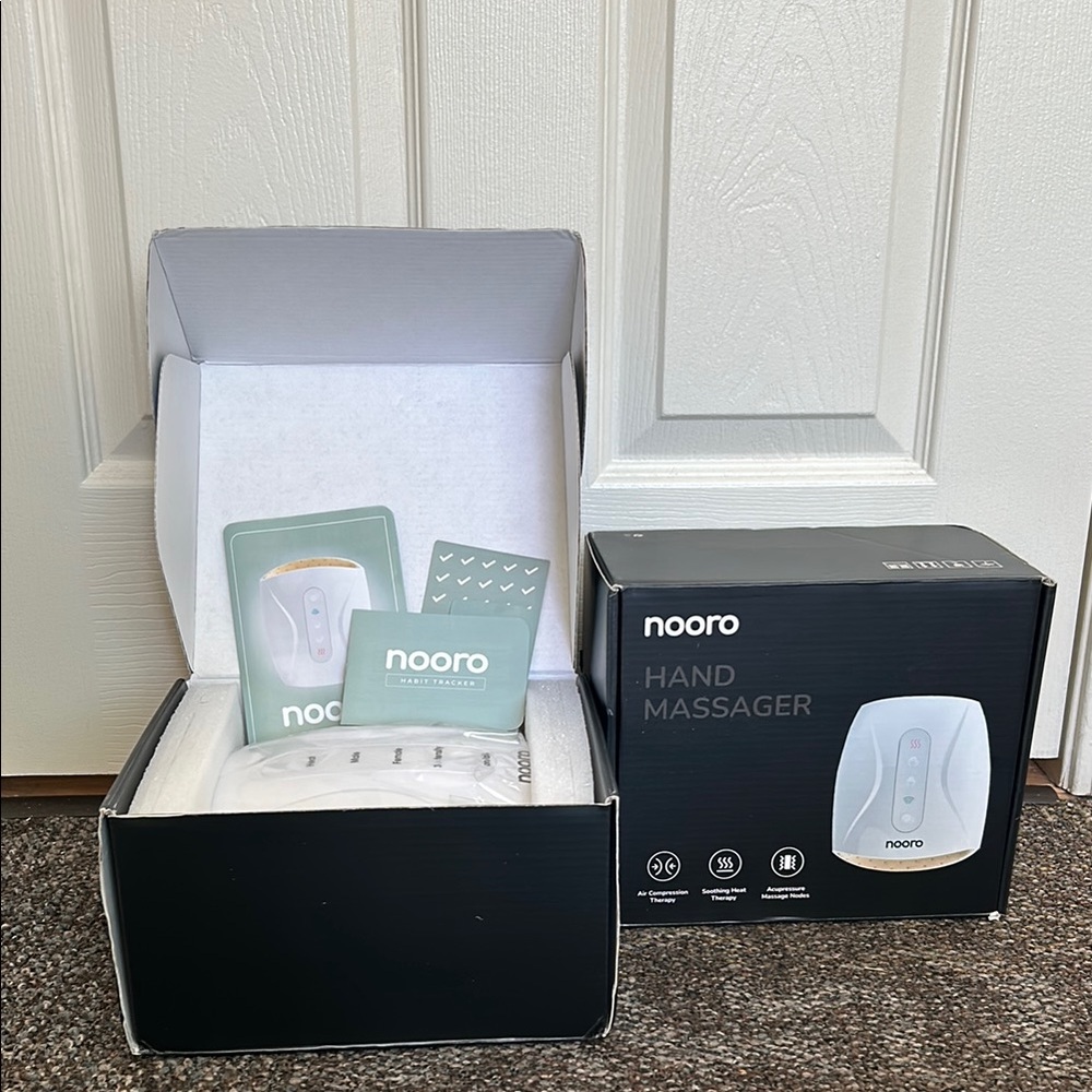 Two Nooro Hand Massagers
